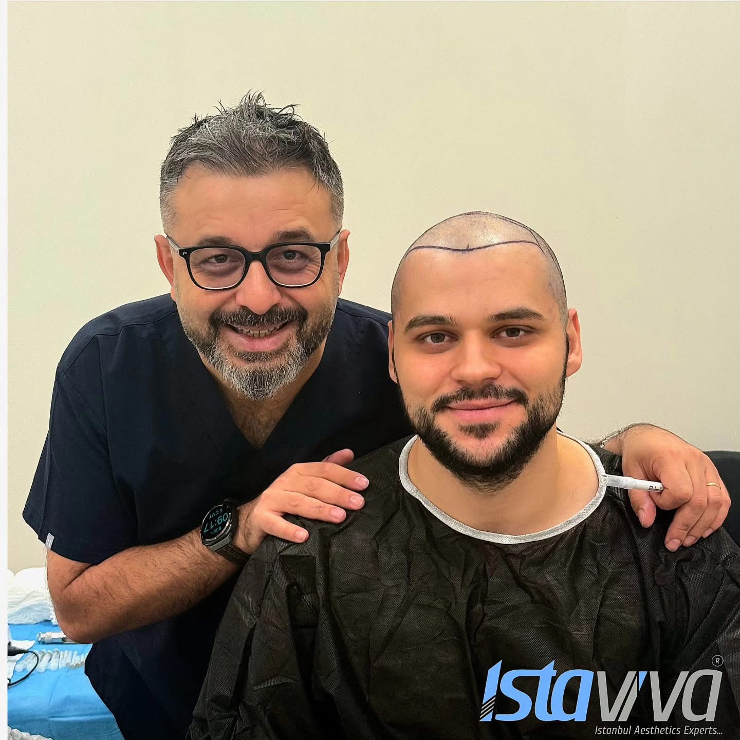 Emre Menekşe with a client after hair transplantation